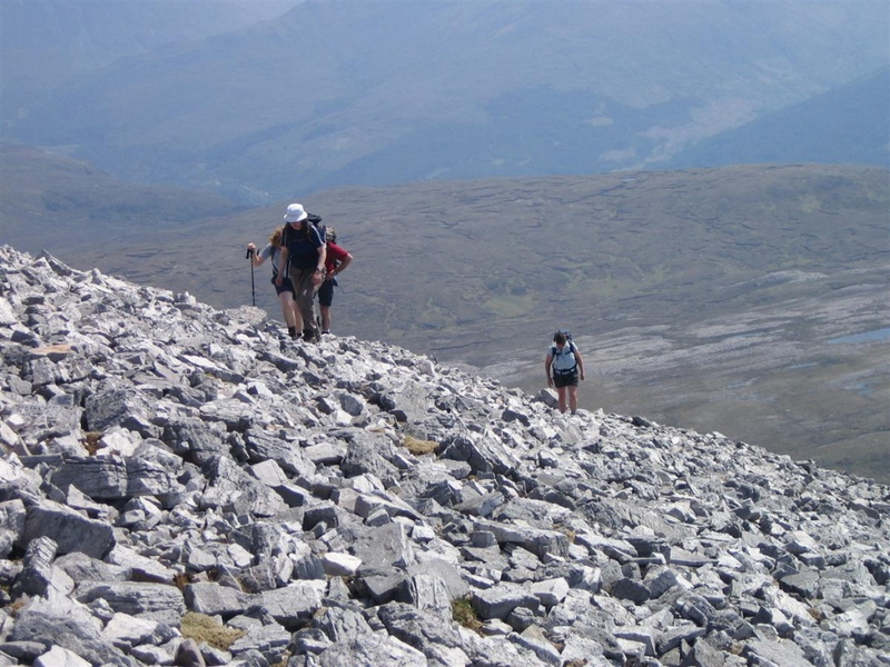Rocky climb up to first top on Beinn Liath Mhor ridge