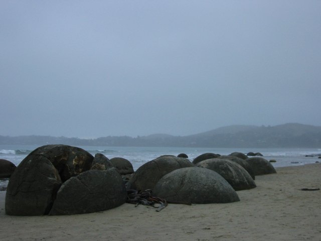 Moeraki Boulders - Rounded by wave erosion into almost perfect sphere's (well at least above the sand)