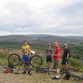 The Gang. Simon is sorting out another puncture :-) Bloke in red T-Shirt 'Kit' is newbie bloke [NW]