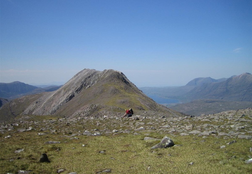 View west along ridge to Beinn Liath Mhor summit. Loch Torridon on right in distance