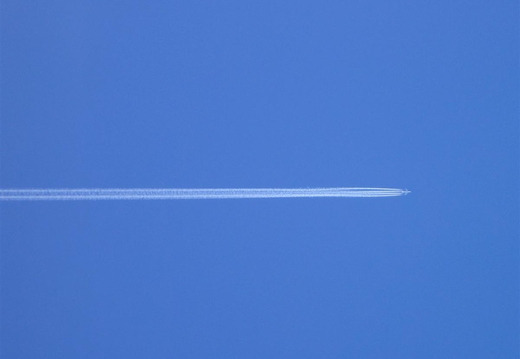 Either a 747 or an A340. Any spotters around?!