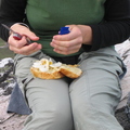 Susannah constructing a sandwich from materials liberated from hotel that morning!!
