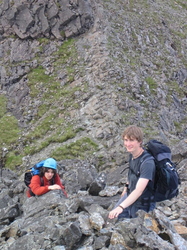 Mo and Valentene climbing up to Sgurr a' Mhadaidh
