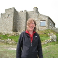 Lucy in front of castle Ruins
