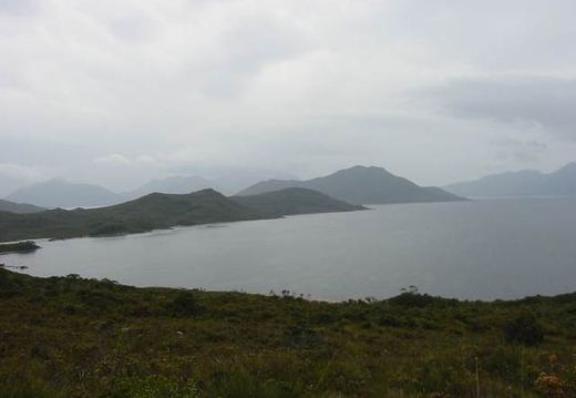 The lonely waters of lake Pedder. This area received more rain than the rest of Tasmania, and only has 30 fine days a year. Idea