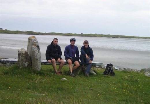 Jack, Nigel and Mo sat on seat 'sculpture' made by local kids.