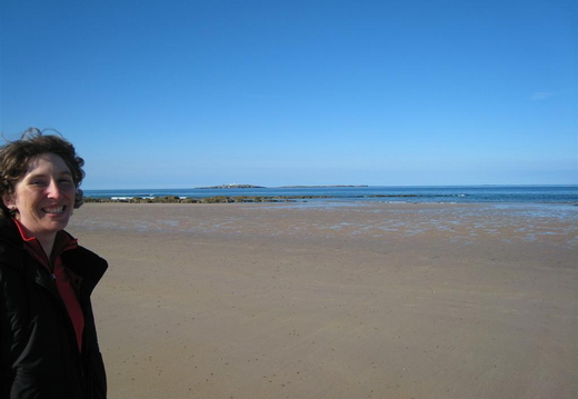 Lucy on the beach at Seahouses