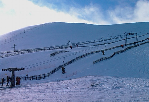 Over Cairnwell lift to Claybokie lift. Cairnwell chair in the distance