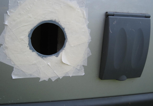Painting around the edge of the filler hole