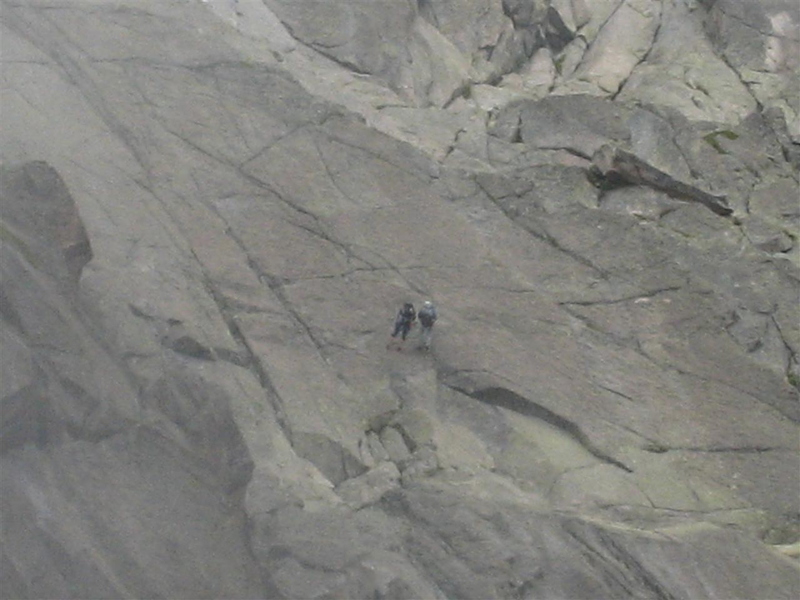 2 climbers abbing off to the left of the Les Pelerins glacier