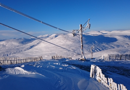 Looking down Meall Odhar tow. Cable off on top 2 towers.