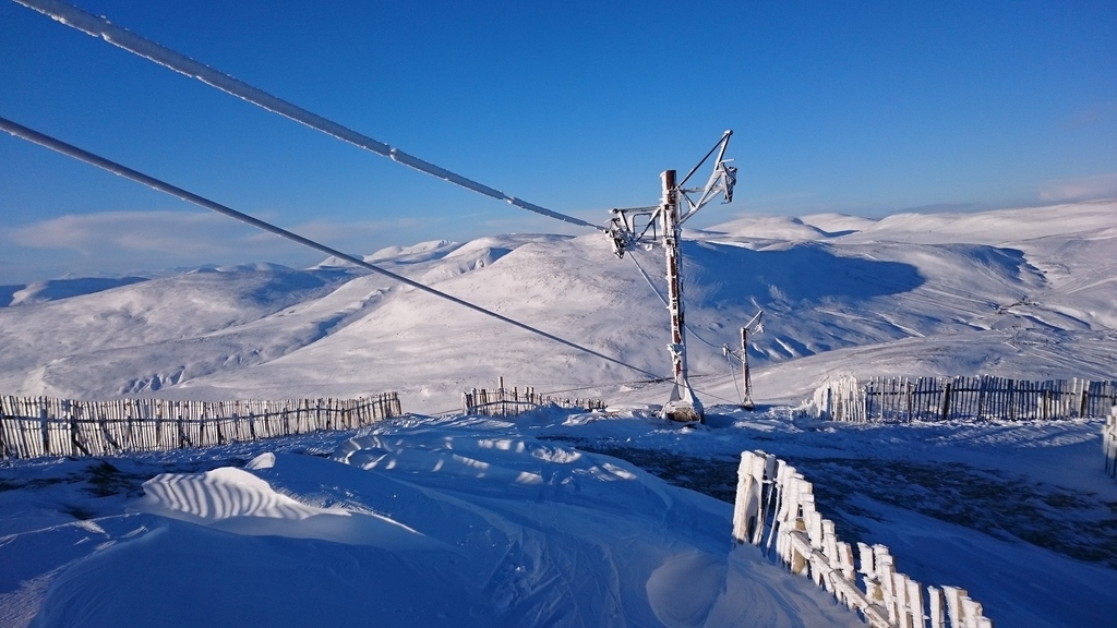 Looking down Meall Odhar tow. Cable off on top 2 towers.