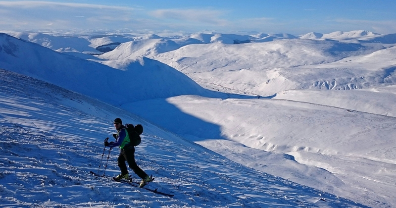 Jim skinning around Glas Maol SW face, we then went left to summit