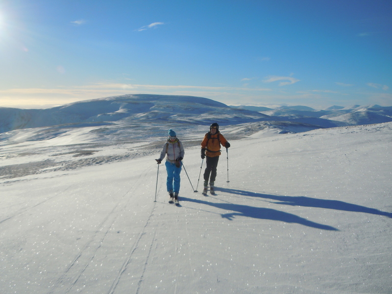 Laura and Nigel approaching Carn of Claise, Glas Maol Behind