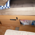 Cupboard under side sofa, more storage under sofa base