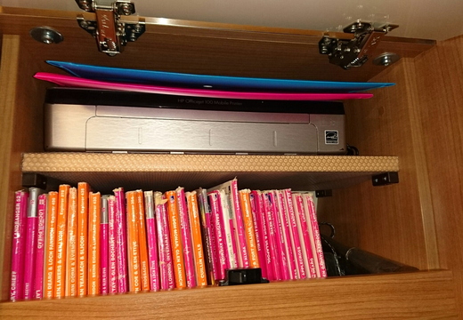 Shelf added to forward overhead locker, houses printer and paper - for printing maps on the move!