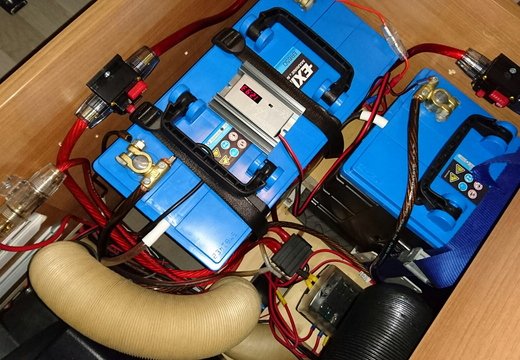 Big batteries - the wee LED thing is snake oil! Supposed to be a battery desulpator!!