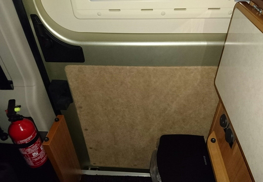 Sliding door insulated within and then carpeted with wall carpet