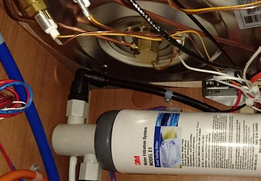 3M Water filter under kitchen sink in line with existing tap